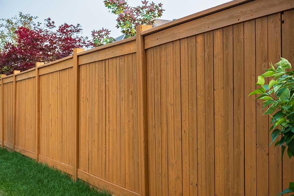 Nice wooden fence around house