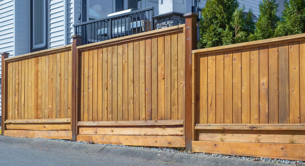 Premade Vs. Stick-Built Wood Fences: Which Is Right For You?